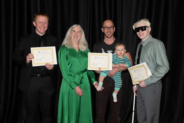 Dean Webb with the three College of Liberal Arts winners of Distinction in Creativity