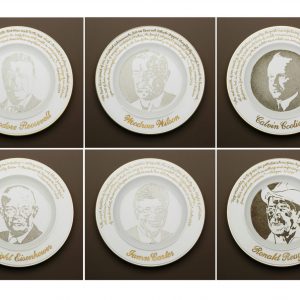 Six plates with images of U.S. presidents detailed on them using air pollution.